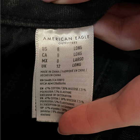 AE Next Level Stretch Distressed Black Jeans - Picture 4 of 4